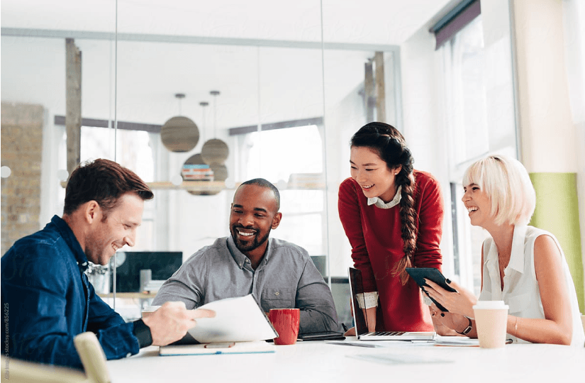 four_people_at_the_desk