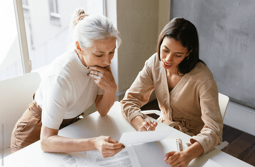 two_people_at_the_desk